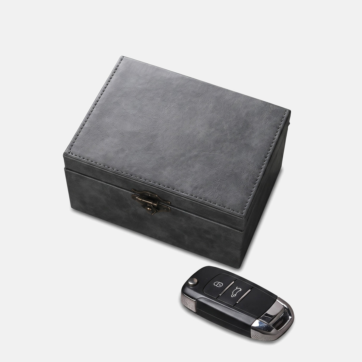 Signal Box Heritage grey vintage leather Faraday key box, closed, with a car key fob
