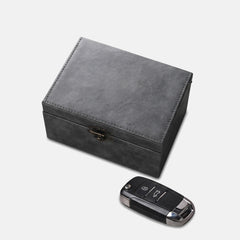 Signal Box Heritage grey vintage leather Faraday key box, closed, with a car key fob
