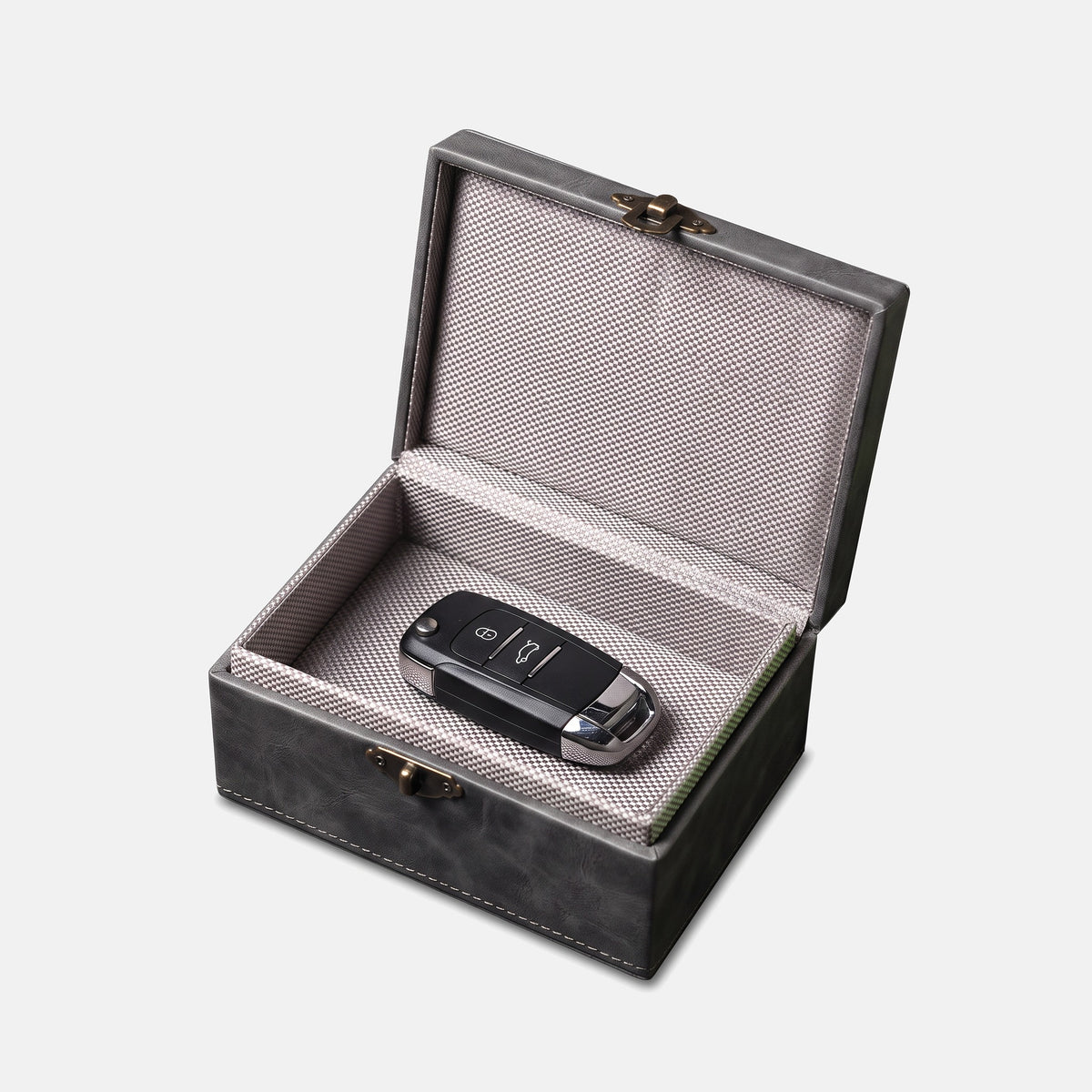 Open Signal Box Heritage with a car key fob on the silver conductive Faraday lining